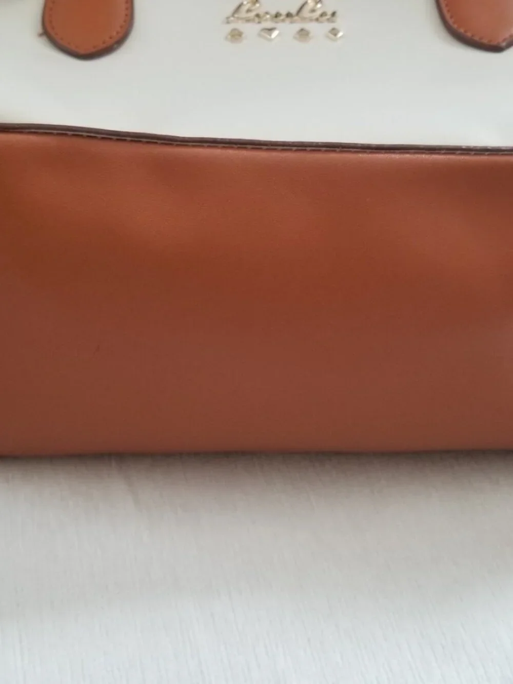 Lou Lu Beige Brown Hand bag Used in excellent condition Like New with out tags